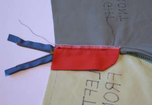 31 back view of zipper shield stitched in place