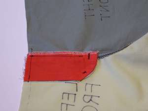 35 back view of bartacks on zipper shield