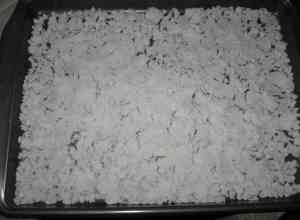 Potato starch spread out on baking pan