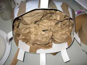 dress form stuffed with crumpled paper